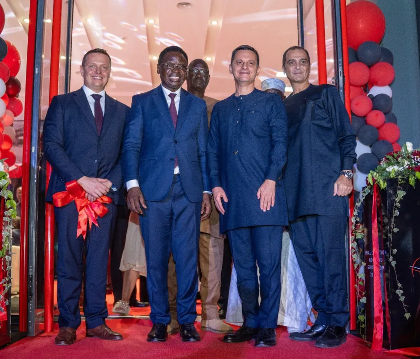 From right to left — Nouhad KALMONI ED JMTC — Salem KALMONI MD JMTC — Dr. Serigne Gueye DIOP Minister of Industry and Commerce Senegal — Maciej KLENKIEWICZ MD Nissan SA and Independents markets of Africa